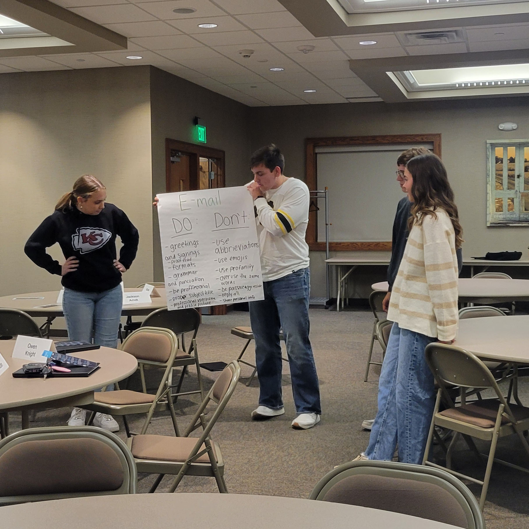 A group of students sharing a presentation.