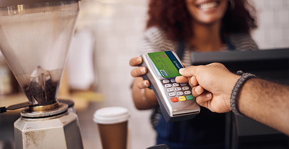 Person paying with credit card