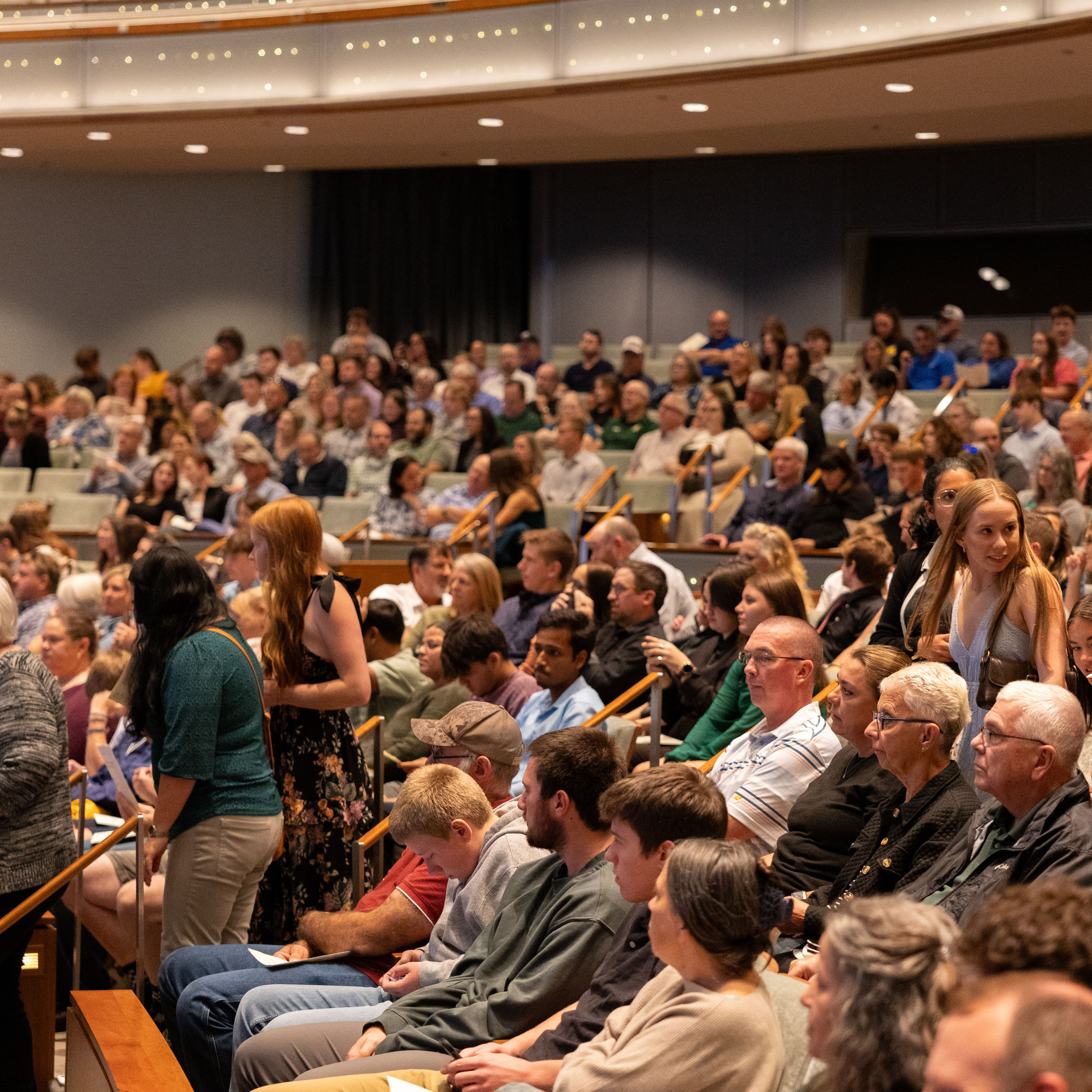 An auditorium filled with Youth Salute attendees.