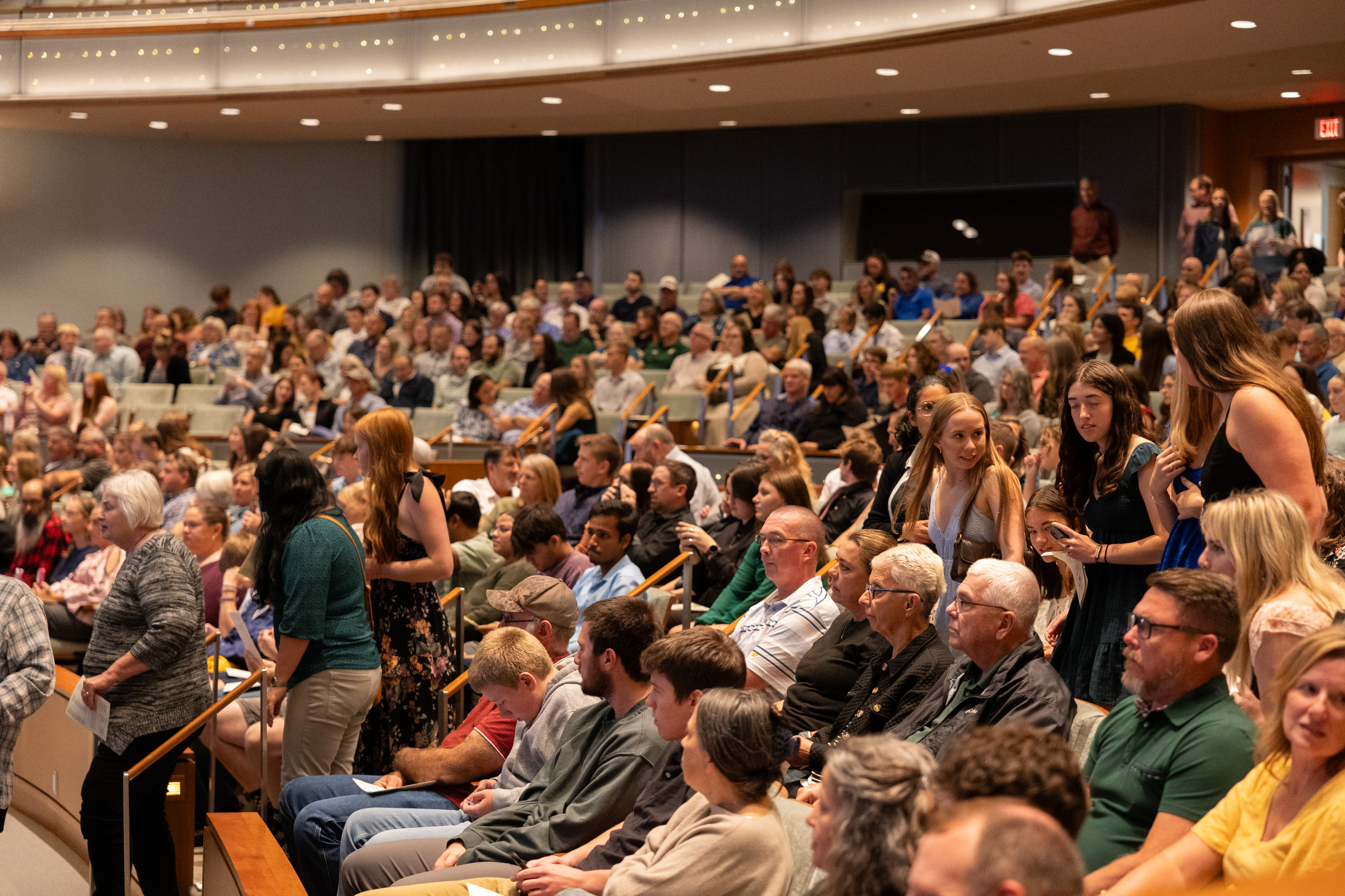An auditorium filled with Youth Salute attendees.