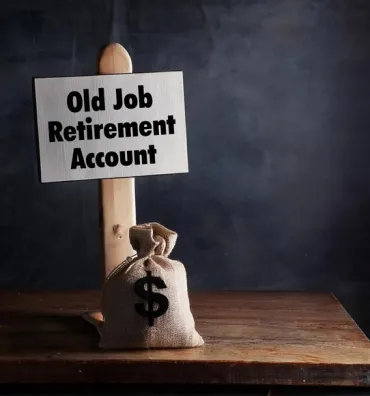 Old job retirement account represented by a money bag