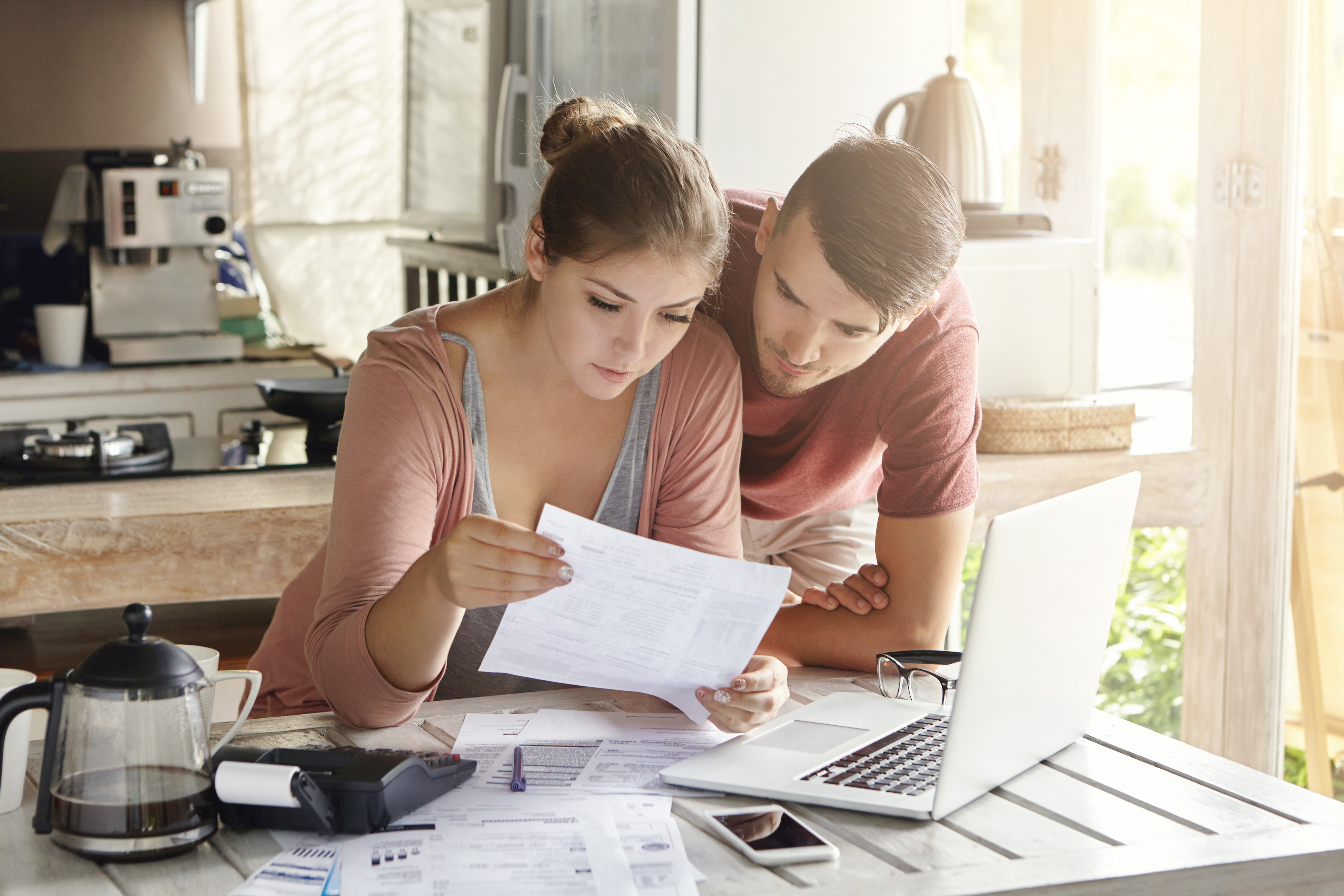 Reviewing financial information at the table